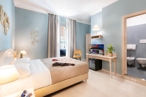 Postelja oz. postelje v sobi nastanitve Piccolo Imperiale