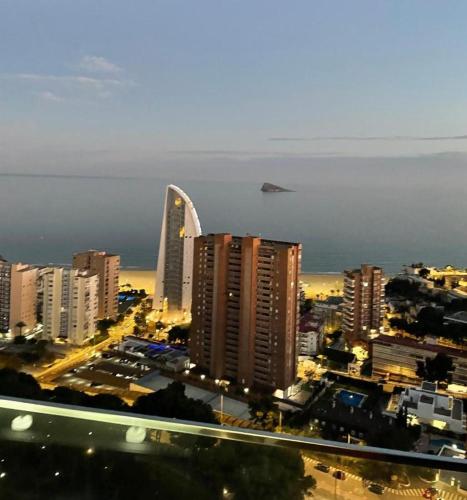 a view of a city with buildings and the ocean at Benidorm Beach Belluba luxury bay in Benidorm