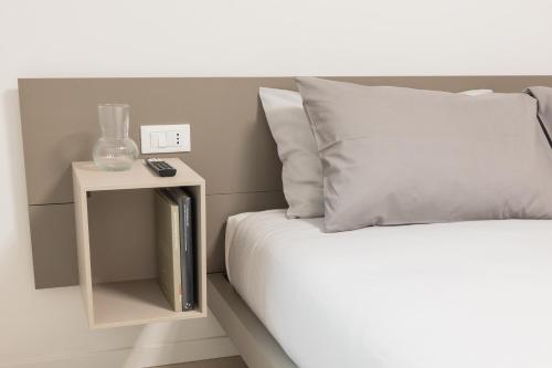 Postel nebo postele na pokoji v ubytování Luxury Station Suite