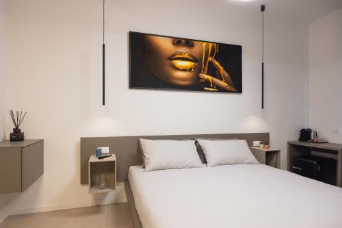 Postel nebo postele na pokoji v ubytování Luxury Station Suite