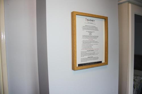 a picture of a menu on a white wall at The Coach Inn in Strabane
