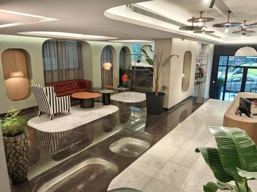 Posezení v ubytování Citi Loft Furnished Apartments