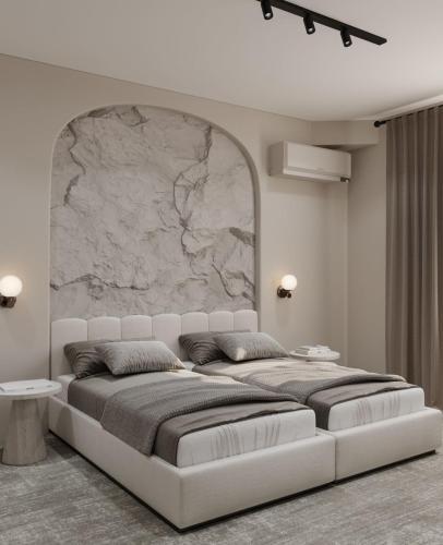 Dastan Hotel Baku tesisinde bir odada yatak veya yataklar