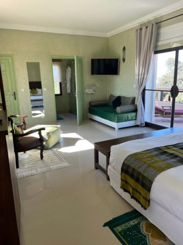 Ένα ή περισσότερα κρεβάτια σε δωμάτιο στο Villa vue mer et campagne