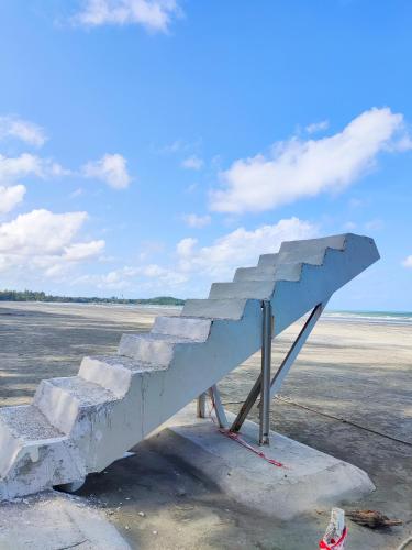 a concrete staircase sitting on top of a runway at Le'Coco Homestay in Tiara Desaru Residence in Desaru