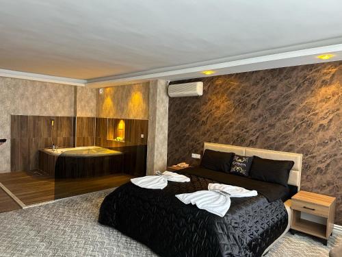 Katil atau katil-katil dalam bilik di ÇANKAYA SUIT HOTEL