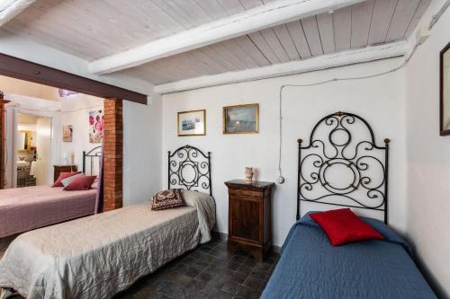 Agriturismo Val Di Notoにあるベッド