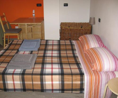 Giường trong phòng chung tại Torrente Rosandra