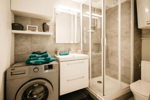 Koupelna v ubytování Cosy T1, à 10 minutes à pieds des plages