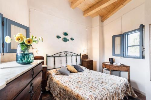 Agriturismo Val Di Notoにあるベッド