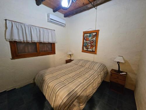 Postel nebo postele na pokoji v ubytování El Gran Tacú - La Soñada