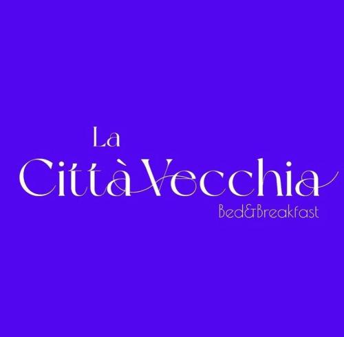 a purple sign with the words la chi chiología at Prione's Apartment Bis in Genova