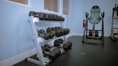 a room with a gym with a weight machine at Princess Vegas Hotel & Casino in Corozal