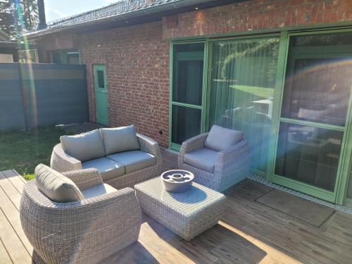 Ruang duduk di Royal Whirlpool Suites Lüneburger Heide