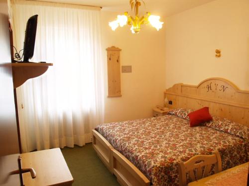 Posteľ alebo postele v izbe v ubytovaní Hotel Negritella