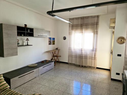 a living room with a couch and a table at Vincenti's House Comiso in Comiso