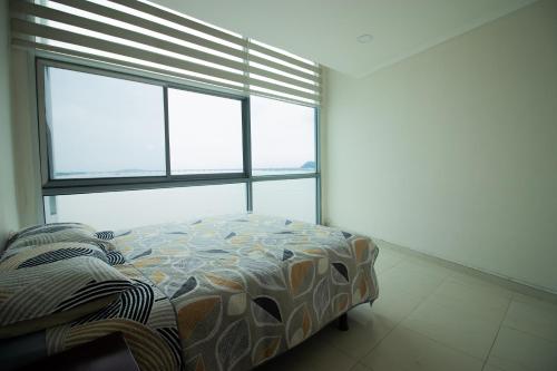 Letto o letti in una camera di Vista frente al rio, exclusivo con piscina