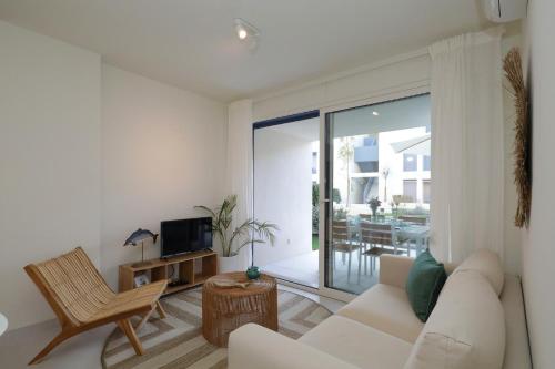 Elegant 2BR Apartment with Pool & Garden