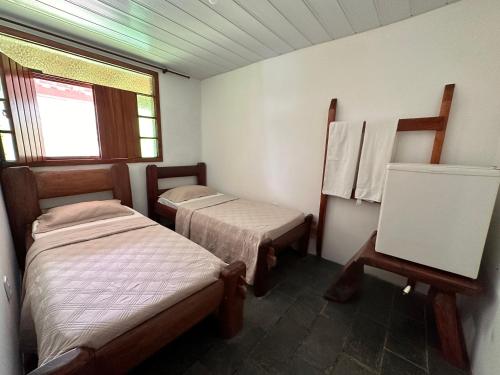 Postel nebo postele na pokoji v ubytování Pousada Sargi&mar