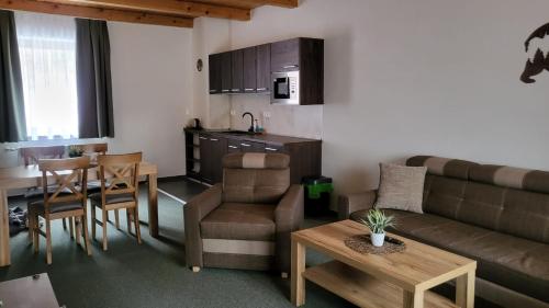 Χώρος καθιστικού στο Apartmány Nízke Tatry - Krpáčovo