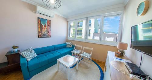 Μια τηλεόραση ή/και κέντρο ψυχαγωγίας στο Apartment Mon Cheri