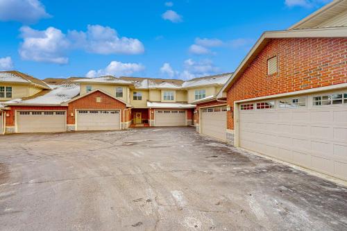 a row of homes with garages at Delton Grand Resort in Wisconsin Dells