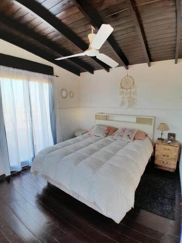 Säng eller sängar i ett rum på Posada Naranja