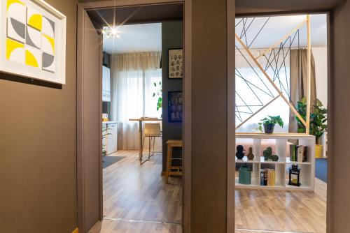 an open door into a room with a living room at Rialto 13 in Treviso