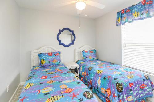 Pelican Landing 2 by Pristine Properties Vacation Rentalsにあるベッド