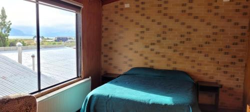 Postel nebo postele na pokoji v ubytování Departamento Céntrico