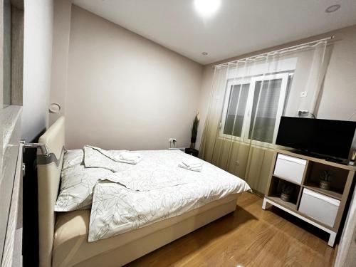 Cama o camas de una habitación en Apartman Natali
