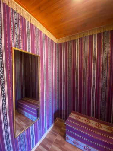 Ein Bett oder Betten in einem Zimmer der Unterkunft Katrina Rum camp