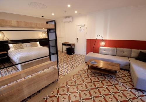 Postel nebo postele na pokoji v ubytování VALOLA Boutique Rooms