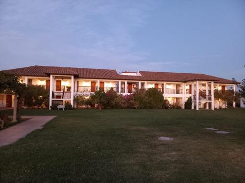 a large house with a lawn in front of it at Hotel Terraviña in Santa Cruz