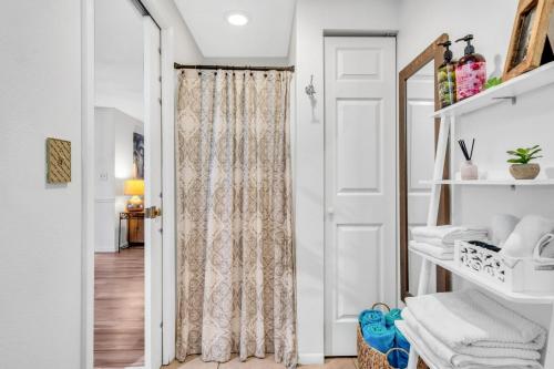 a room with a door and a mirror at Luxury Zen Den with heated pool just off Siesta Key in Sarasota