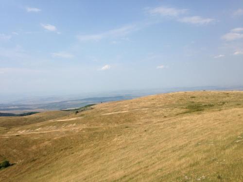 a view from the top of a hill at Pensiunea Casa Buna in Gîrbova