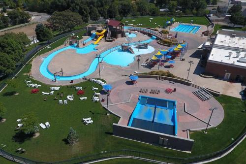 an aerial view of a large water park at 6 King Bedrooms, Sleeps 20, 8 Rooms, Bikes, HotTub in Lindon