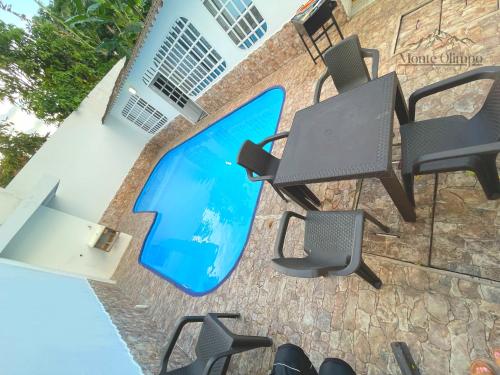 Der Swimmingpool an oder in der Nähe von Casablanca - Casa privada a las afueras de Villavicencio