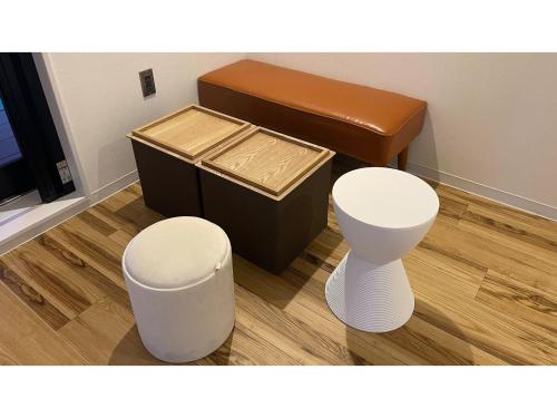 a bathroom with a toilet and a stool at River Side Arashiyama - Vacation STAY 86224v in Kyoto