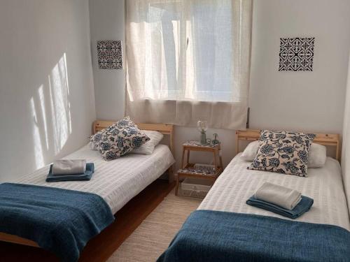 Ένα ή περισσότερα κρεβάτια σε δωμάτιο στο Casa Barros