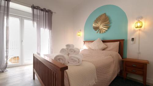 Кровать или кровати в номере Nomadara - Boutique B&B