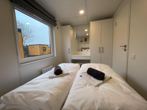 Cama o camas de una habitación en Holiday Home Tiny Haus Elena by Interhome