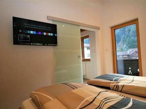 Postel nebo postele na pokoji v ubytování Apartment Johann by Interhome