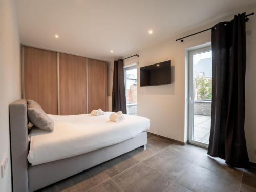 Katil atau katil-katil dalam bilik di Apartment Beaufort 76 with two terraces by Interhome