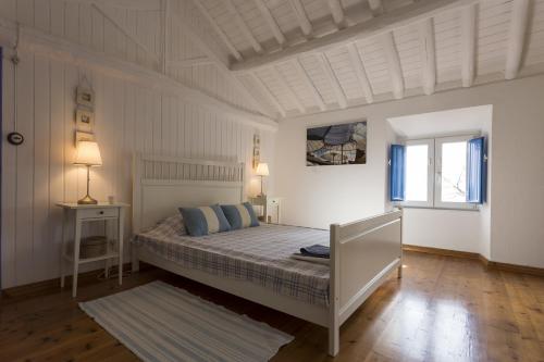 A bed or beds in a room at Casa do Maranhão - Nature & Views Experience