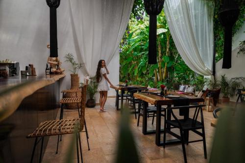 Un restaurante o sitio para comer en Olbil Hotel Boutique
