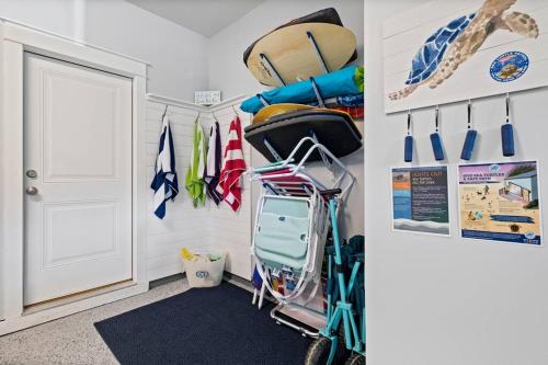 a room with a hallway with a room with a walk in closet at Luxury Getaway! Brand New 4BD! Near Coligny Beach in Hilton Head Island