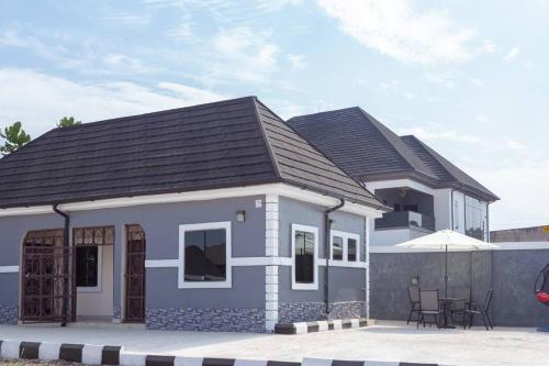 a rendering of a small house at Enugu Airbnb / shortlet Serviced Apartment in Enugu