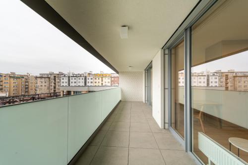 a balcony of a building with views of the city at Residence Mozaika in Prague