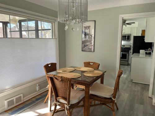 a dining room with a table and chairs at Private suite near Cleveland Clinic in Shaker Heights